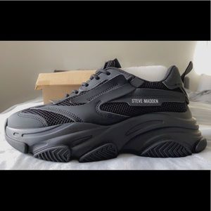 Never worn Black Sneakers